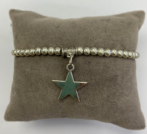 Silver Coloured Bracelet with Solid Star Charm