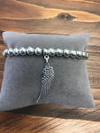 Silver Coloured Bracelet with Angel Wing Charm